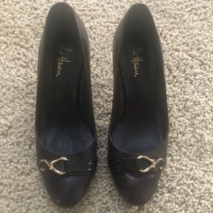 Dark brown Cole Haan heels with gold hardware